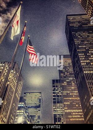 Nation flags and skyscrapers along Avenue of the Americas at dusk , NYC Stock Photo