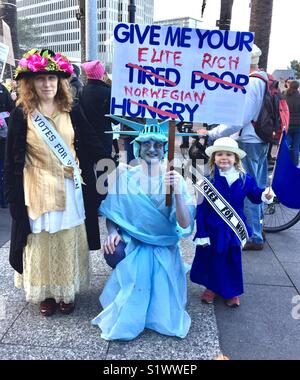 Protesters at Women's March, San Francisco, California, USA.  January 20, 2018. Suffragette, Statue of Liberty, mini-suffragette. Stock Photo