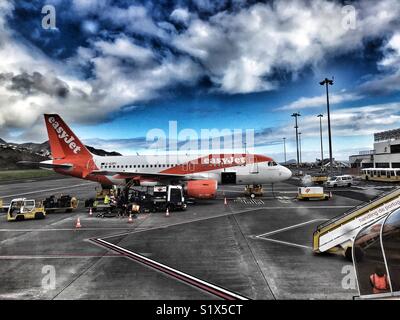 EasyJet aeroplane on the tarmac at Funchal airport on the island of Madeira, Portugal Stock Photo