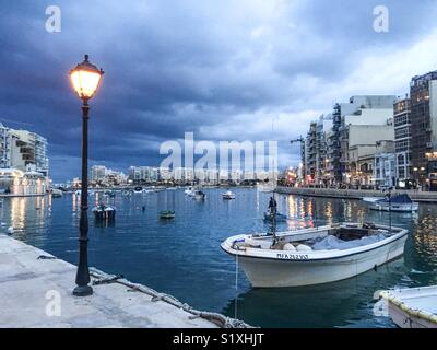 Stormy skies over Spinola Bay, St julians, Malta Stock Photo