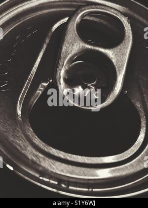 Closeup view of opened aluminum soda pop can top in black and white Stock Photo