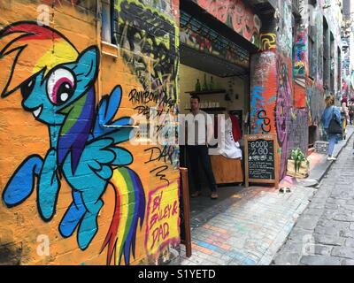 Hosier Lane in Melbourne with coffee shop and street art Stock Photo