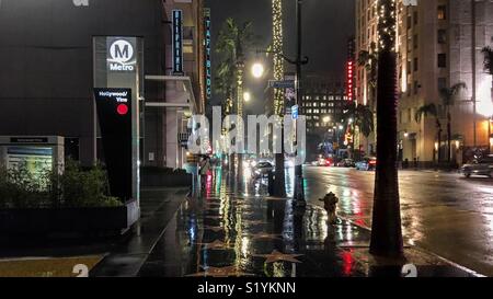 Hollywood Boulevard, Los Angeles, with the Walk of Fame at night in the rain Stock Photo