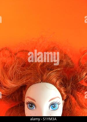 Close up of doll  with red hair. Stock Photo