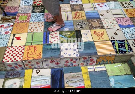 Tile Art with differnt colors and designs on a market in Israel