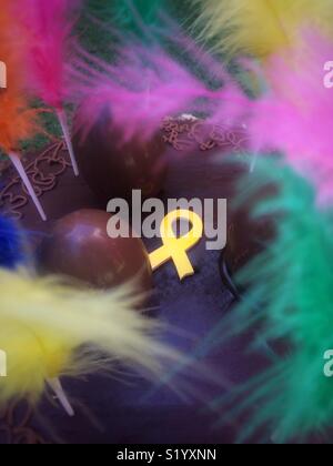 Easter chocolate gluten free home made cake with yellow ribbon ornament Stock Photo