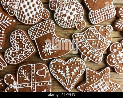 Full screen of Christmas gingerbread cookies on a wooden table Stock Photo