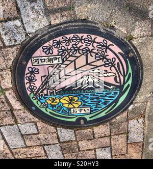 Mount Fuji inspired manhole cover in Japan.