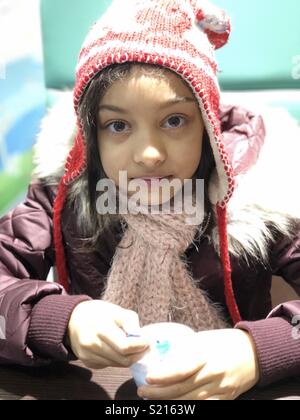 Cute girl eating ice cream Stock Photo