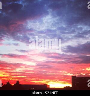 Colourful sunset over Glasgow Stock Photo