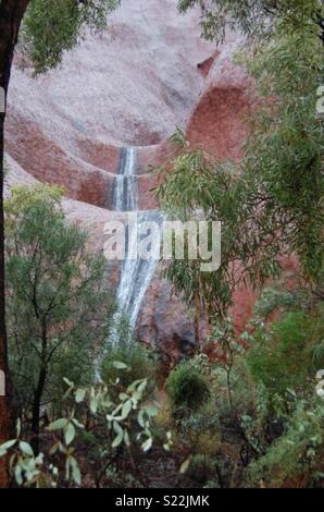 Waterfalls down Uluru Stock Photo