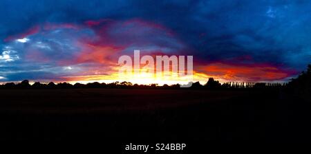 Vibrant Sunset From A Quiet Sussex Road Stock Photo - Alamy