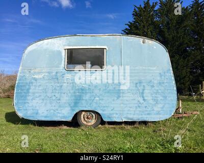 Old blue caravan Stock Photo