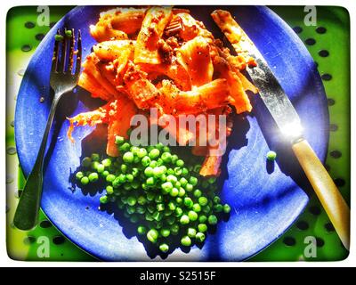 Waitrose Italian beef Bolognese pasta bake and peas Stock Photo