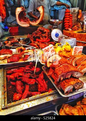Traditional Cantonese barbequed meats and poultry, or Siu Mei, for sale in a food market, Yuen Long, New Territories, Hong Kong Stock Photo