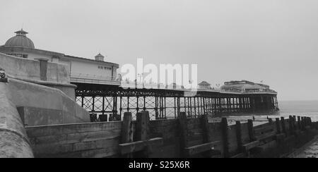 Cromer pier on a dull day. Stock Photo