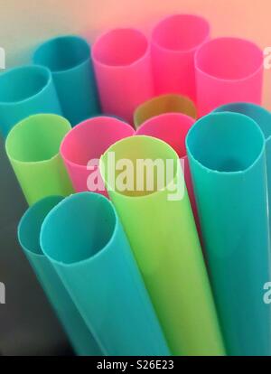 Closeup image of bright pastel coloured plastic straws Stock Photo
