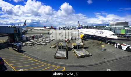 Airport tarmac activities, Seattle Tacoma airport, USA. Stock Photo