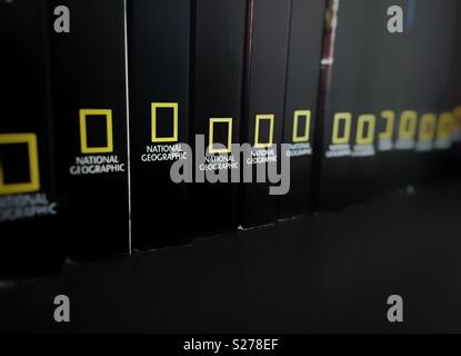 Rome, italy, June 29th 2018: spines of books stored in a black shelf with the National Geographic logo Stock Photo