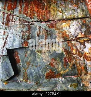 Natural exposed rock from a sea cave presented as an abstract tile. Stock Photo