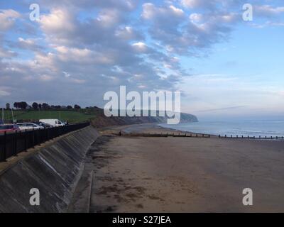 Yaverland Beach at dusk with Culver Cliff in the background. Stock Photo