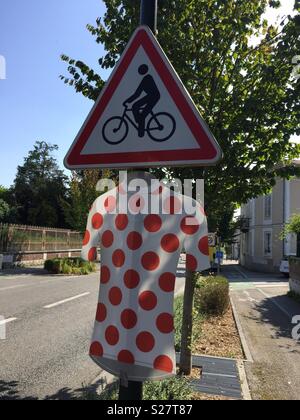 Polka dot jersey roadside decoration on the route of the 2018 Tour de France, Vernon, Normandy, France Stock Photo