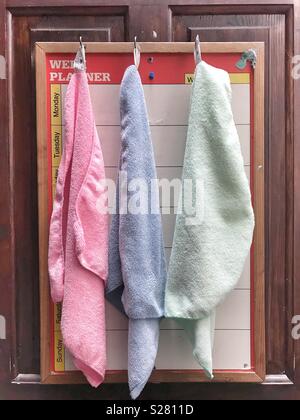 Hanging cleaning cloths for the weekly clean Stock Photo