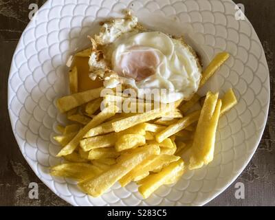 fried egg with chips Stock Photo