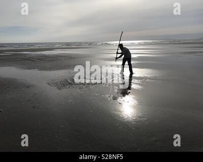 Silhouette of Samurai on Beach Stock Photo