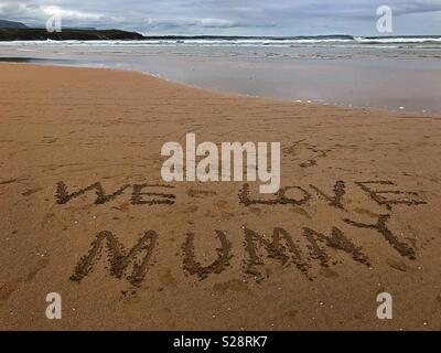 Writing on the sand at Bundoran County Donegal. Stock Photo