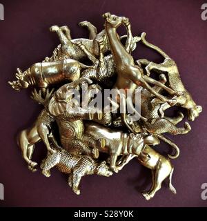 A pile of gold animal figurines Stock Photo - Alamy