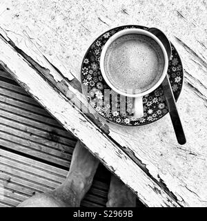 Add a bit of joy to life, get yourself flowers and coffee. Stock Photo