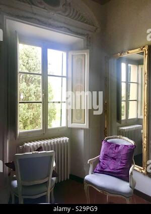 Morning Sunshine Spilling Through the Window in Florence Italy Stock Photo