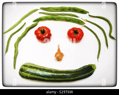 Organically home grown vegetables in the shape of a face Stock Photo
