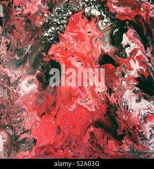 Abstract liquid paint background in red, black, gray, and white. Stock Photo