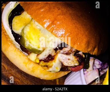 Cheesy burger in brioche bun Stock Photo