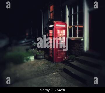 Old UK telephone box in a remote Welsh village. Stock Photo