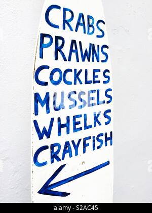 Fish for sale sign outside fresh seafood supplier Stock Photo - Alamy