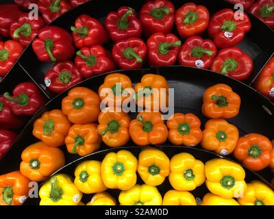 Display of Bell Peppers in supermarket aisle Stock Photo