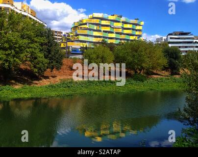 Reflection of the new modern building Koh-I-Noor in the river Lez, Montpellier France Stock Photo