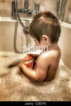 Baby in a bath Stock Photo