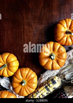 Fall decorations on dark wood Stock Photo