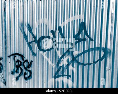 Graffiti on corrugated tin Voulagmeni Athens fry Stock Photo
