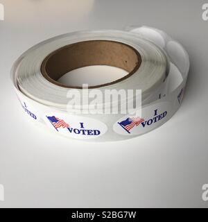 Roll of I VOTED stickers with United States flag Stock Photo