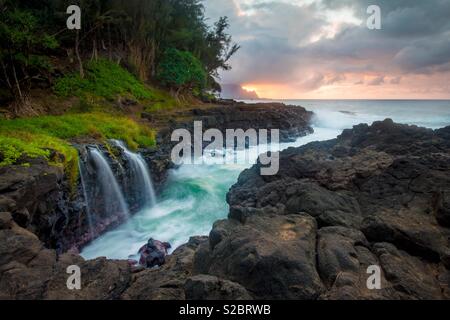 Queens bath on Kauai at sunset Stock Photo