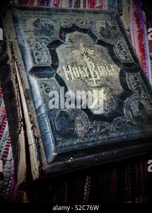 Old family Bible with ornate cover Stock Photo