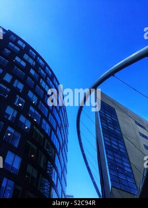 Modern and contemporary skyscrapers or high rise buildings with angular lines and soft curves Stock Photo