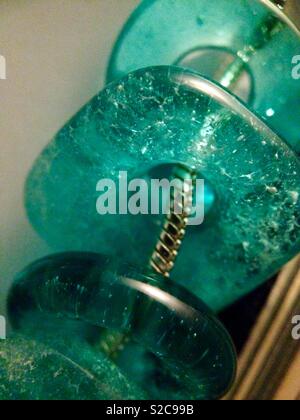 Handmade turquoise teal glass beads on silver necklace chain Stock Photo
