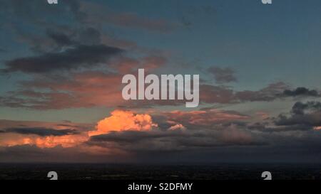 Sunset on clouds Stock Photo