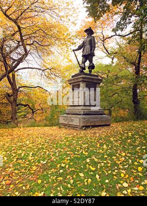 The mayflower descendent statue on Pilgrim Hill in central park on a bright fall day, NYC, USA Stock Photo